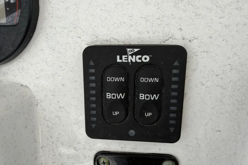 Slide: The Image of Lenco trim tab control panel on 2016 Sea Hunt Ultra 234 boat. - 29