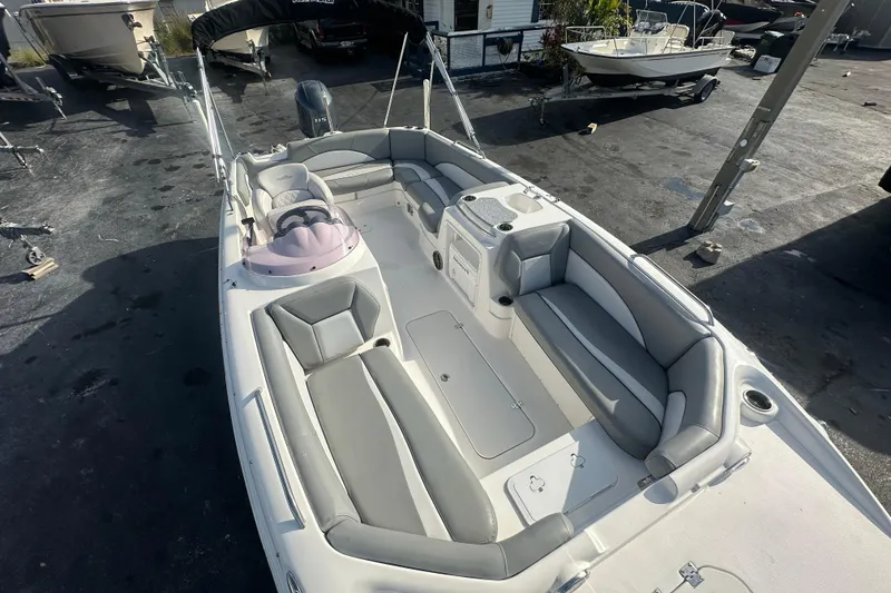 Slide: The Image of 2022 NauticStar 203 SC boat with spacious seating and modern design. - 10