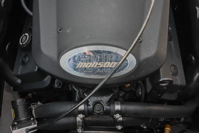 Slide: The Image of 2004 Malibu Wakesetter 23 XTi engine, featuring Monsoon 340 horsepower. - 44