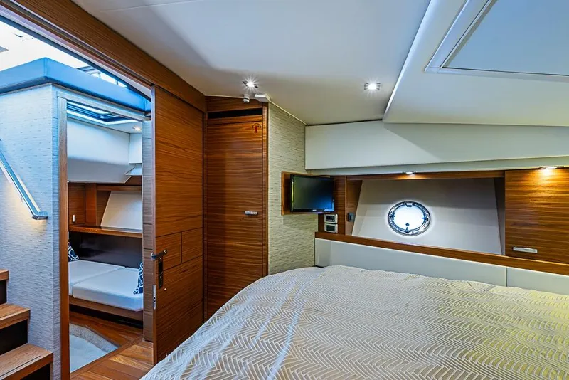 Slide: The Image of Luxurious interior of 2018 Tiara Yachts C39 Coupe with wood accents and modern amenities. - 51