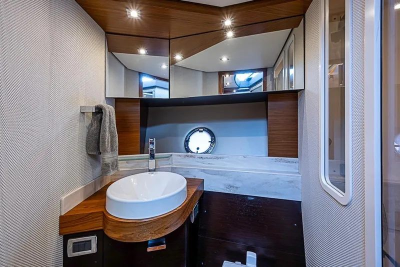 Slide: The Image of Luxurious bathroom interior of 2018 Tiara Yachts C39 Coupe with modern fixtures and elegant design. - 53