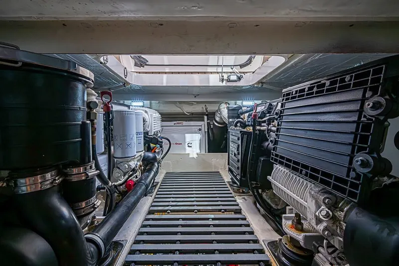 Slide: The Image of Engine room of 2018 Tiara Yachts C39 Coupe, showcasing mechanical components and systems. - 59