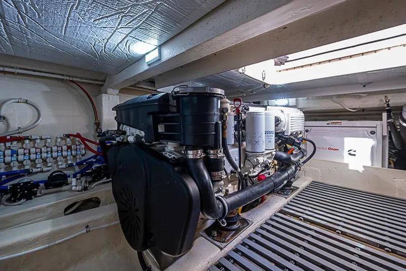 Slide: The Image of Engine room of 2018 Tiara Yachts C39 Coupe, showcasing mechanical components and systems. - 60