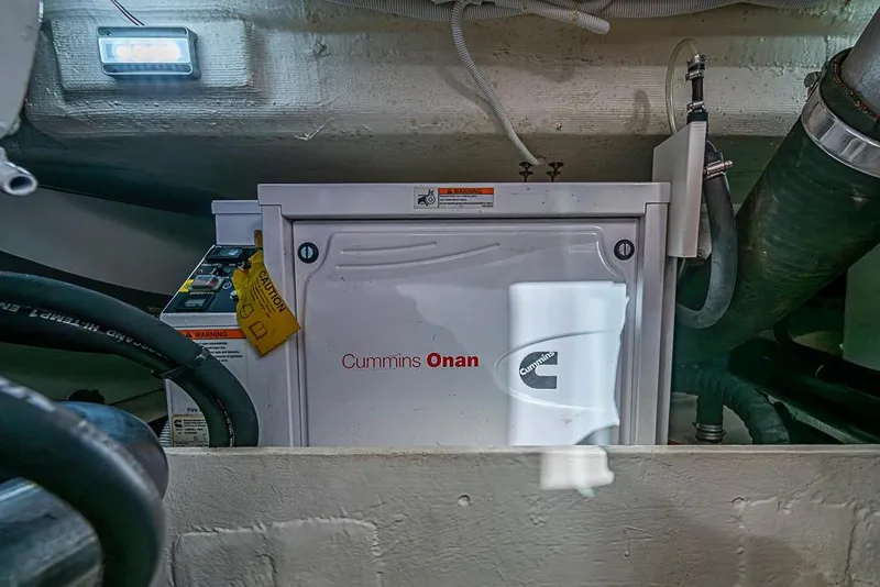 Slide: The Image of Engine room of 2018 Tiara Yachts C39 Coupe with Cummins Onan generator. - 64