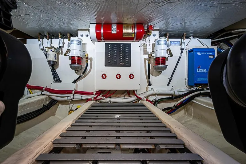 Slide: The Image of Engine room of 2018 Tiara Yachts C39 Coupe with fire suppression system and battery charger. - 65