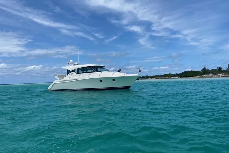 Slide: The Image of 2018 Tiara Yachts C39 Coupe on turquoise water under a clear blue sky. - 67