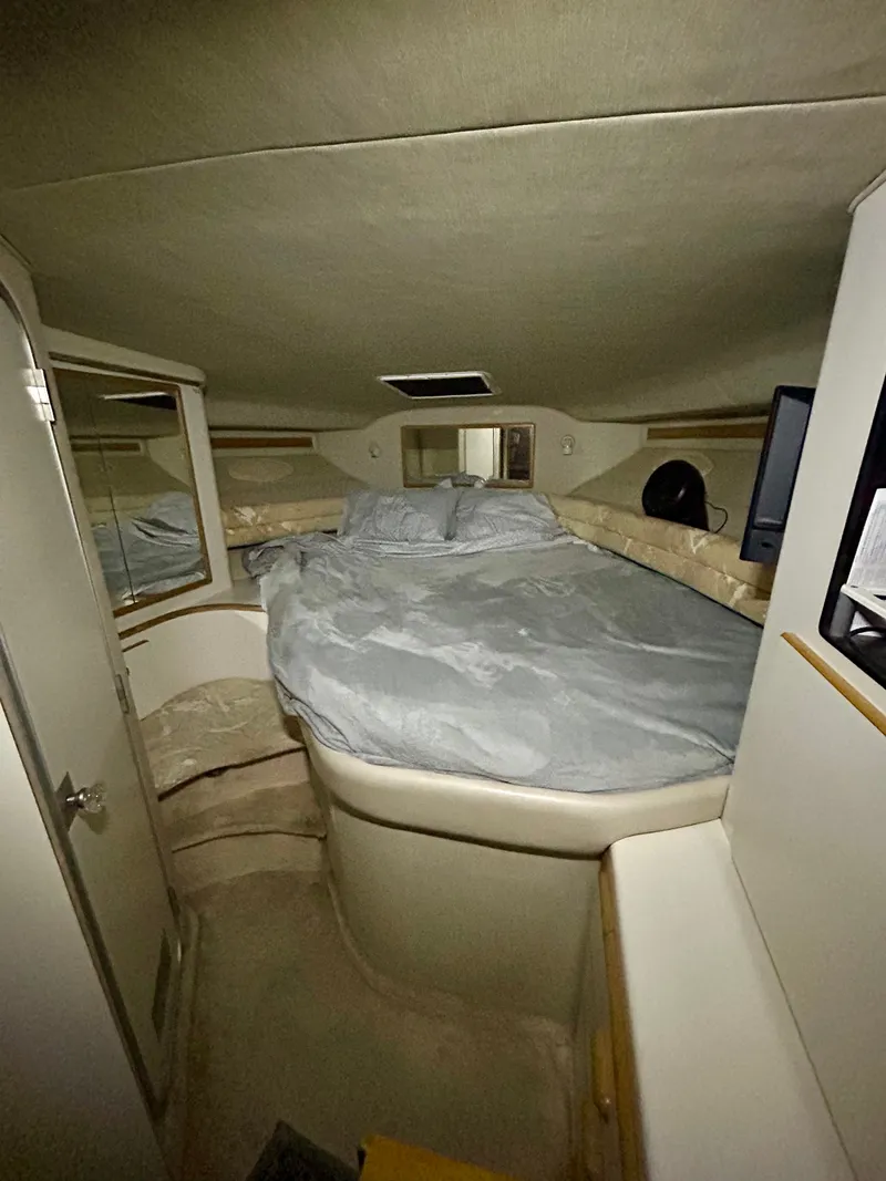 Slide: The Image of Interior of 1996 Sea Ray 370 Sedan Bridge, cozy bedroom. - 14