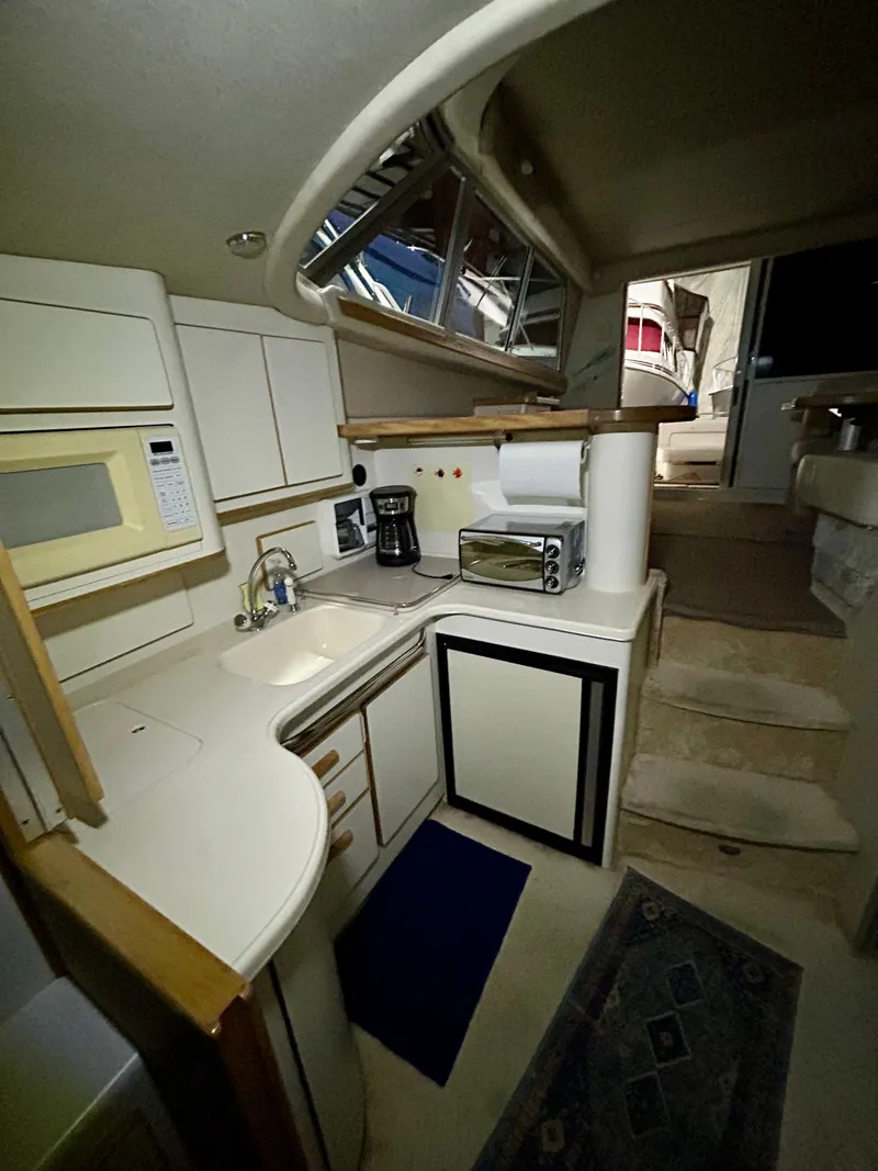 Slide: The Image of Interior of 1996 Sea Ray 370 Sedan Bridge yacht. - 16