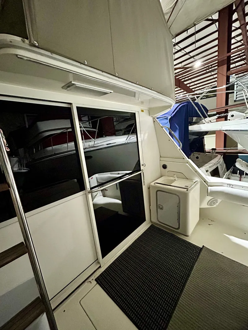 Slide: The Image of Interior view of 1996 Sea Ray 370 Sedan Bridge in dock. - 22