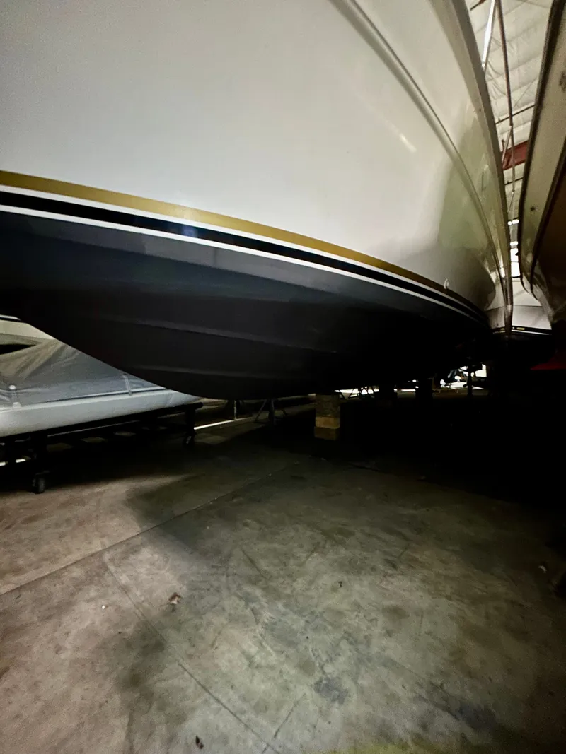 Slide: The Image of Underside of a 1996 Sea Ray 370 Sedan Bridge in storage. - 27