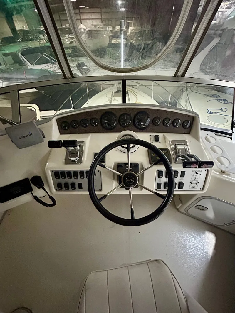 Slide: The Image of 1996 Sea Ray 370 Sedan Bridge helm station. - 3