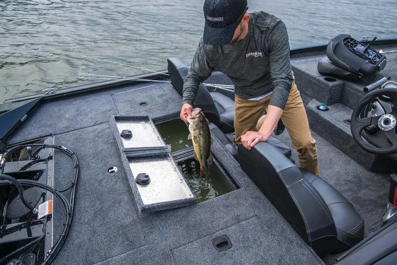 Slide: The Image of Aerial view of a large commercial building with parked vehicles, surrounded by trees. - 11