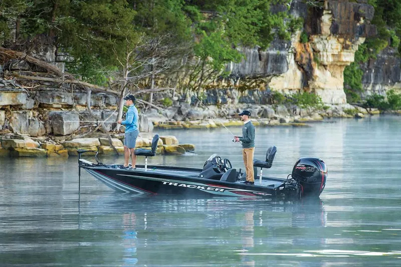 Slide: The Image of 2020 Tracker Pro Team 195 TXW boat on trailer, parked outdoors. - 7