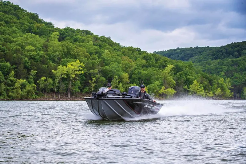 Slide: The Image of 2020 Tracker Pro Team 195 TXW boat on trailer, parked outdoors. - 9