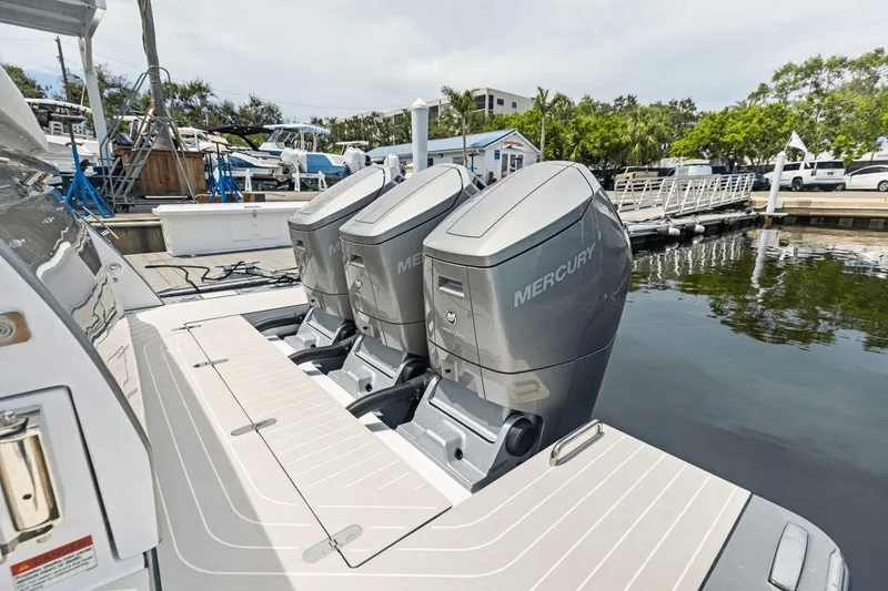 Slide: The Image of 2026 Azimut Verve 48 with triple Mercury outboard engines docked at marina. - 11