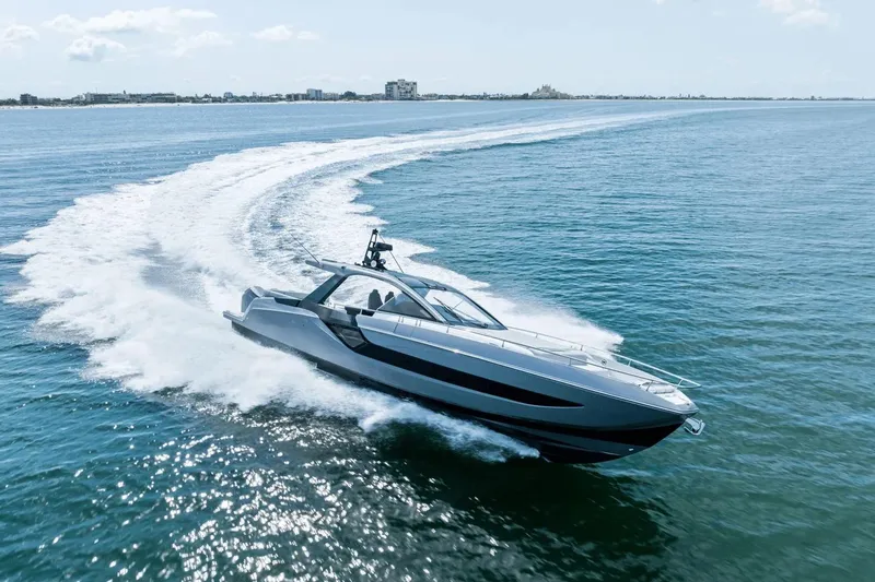 Slide: The Image of 2026 Azimut Verve 48 yacht cruising swiftly on open water. - 2