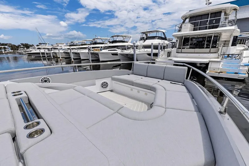 Slide: The Image of 2026 Azimut Verve 48 luxury yacht with spacious deck, docked at marina. - 23