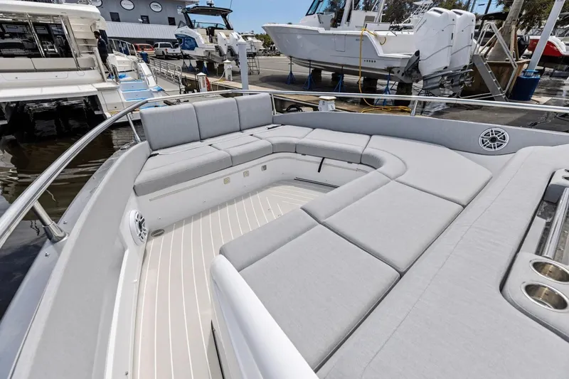 Slide: The Image of Luxurious seating area on 2026 Azimut Verve 48 yacht at marina. - 24