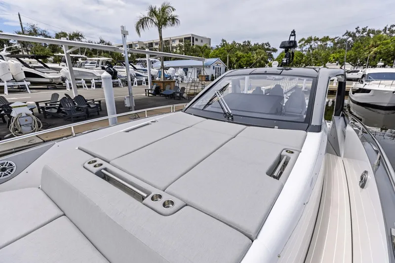 Slide: The Image of 2026 Azimut Verve 48 luxury yacht docked at marina, showcasing sleek design and spacious deck. - 25