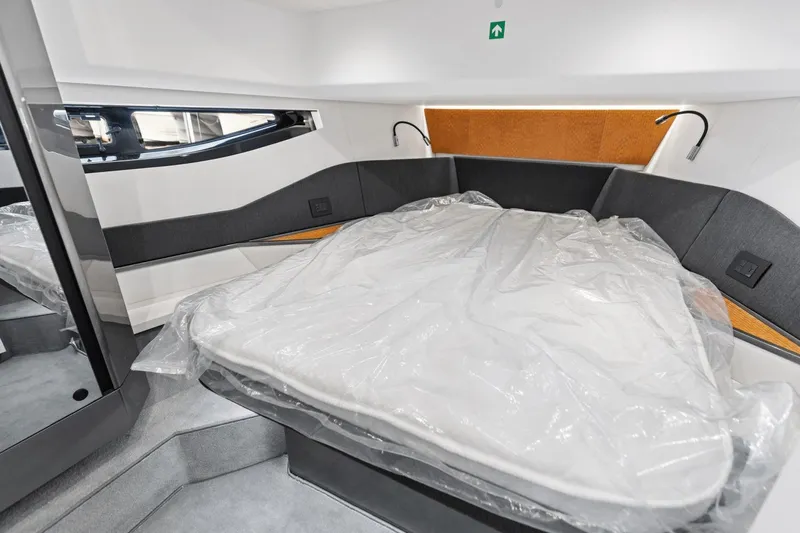 Slide: The Image of 2026 Azimut Verve 48 yacht interior cabin with modern design and comfortable bedding. - 30