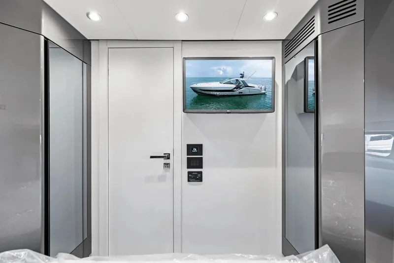 Slide: The Image of Interior of 2026 Azimut Verve 48 yacht with modern design and wall-mounted TV. - 31