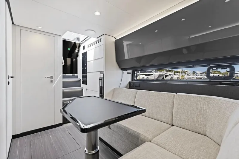 Slide: The Image of Luxurious interior of 2026 Azimut Verve 48 yacht with modern seating and sleek design. - 32