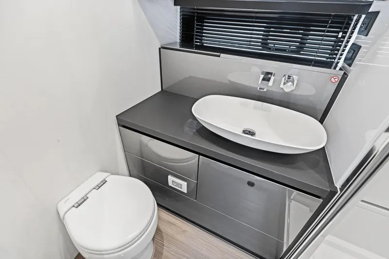 Slide: The Image of Modern bathroom in 2026 Azimut Verve 48 yacht with sleek sink and toilet. - 35