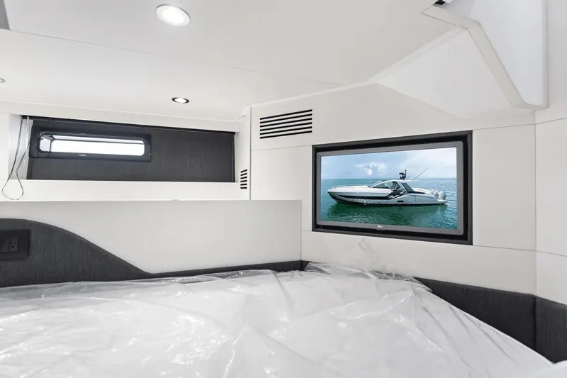 Slide: The Image of Interior cabin of 2026 Azimut Verve 48 yacht with window view. - 37