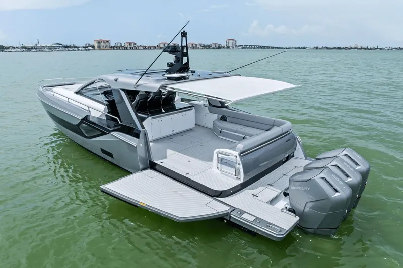 Slide: The Image of 2026 Azimut Verve 48 luxury yacht with triple Mercury engines on calm water. - 8