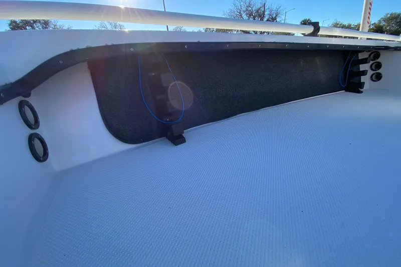 Slide: The Image of 1999 Silver King Signature 16 boat console with Mercury engine controls and rod holders. - 29