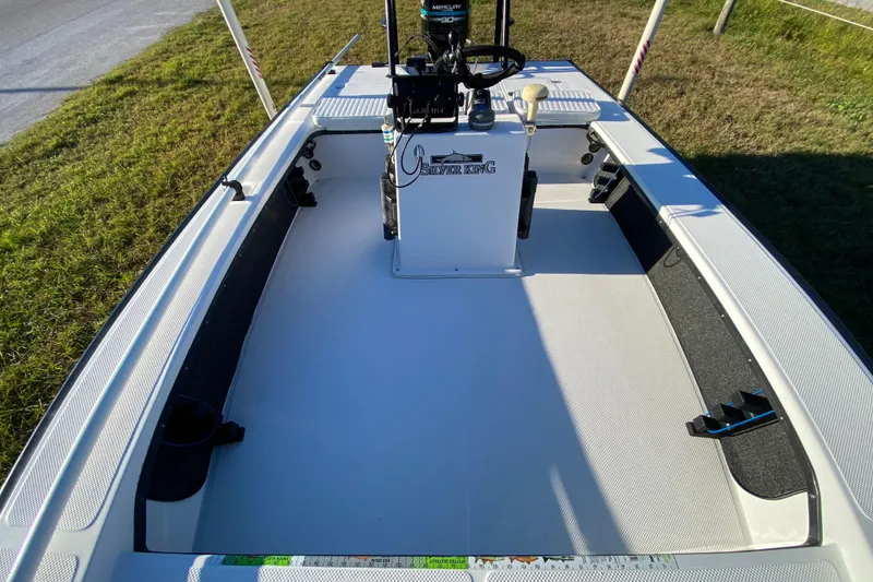 Slide: The Image of 1999 Silver King Signature 16 boat dashboard with Garmin navigation system. - 31