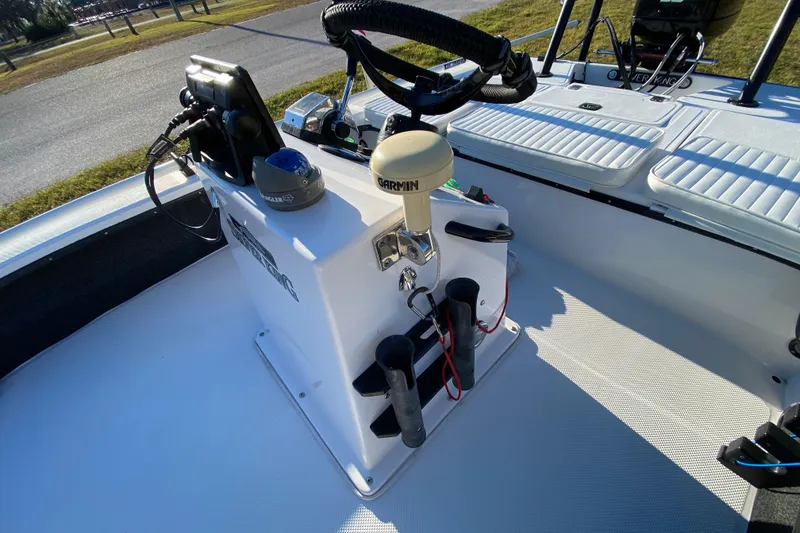 Slide: The Image of 1999 Silver King Signature 16 boat console with storage compartment and gauges. - 33