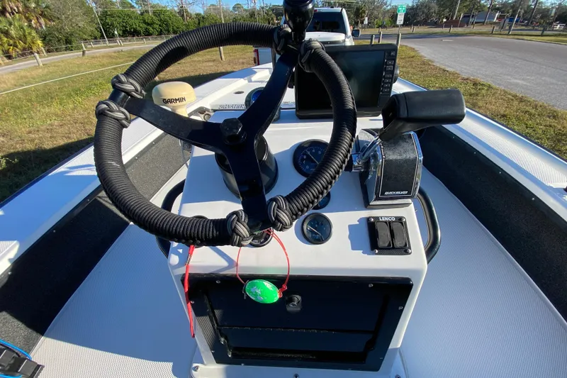 Slide: The Image of 1999 Silver King Signature 16 boat control panel with radio and wiring. - 34