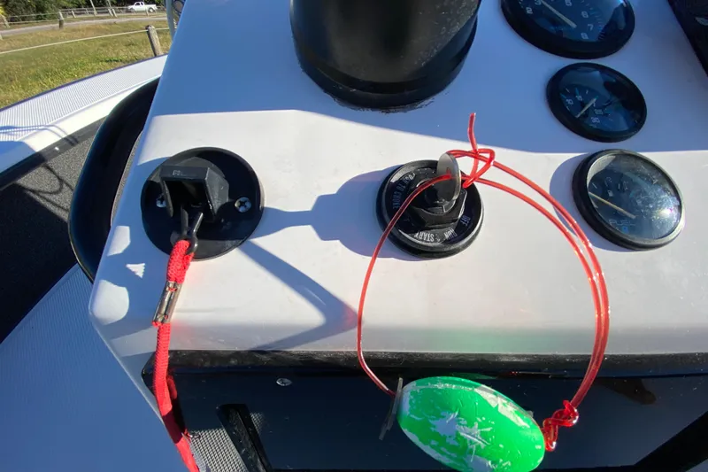 Slide: The Image of 1999 Silver King Signature 16 boat with Mercury 90 engine on grassy background. - 37