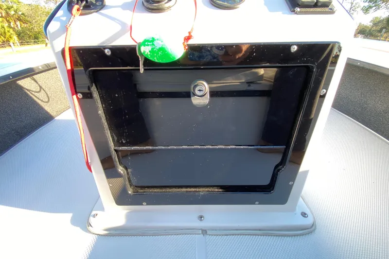 Slide: The Image of 1999 Silver King Signature 16 boat deck with textured surface and hatch. - 38