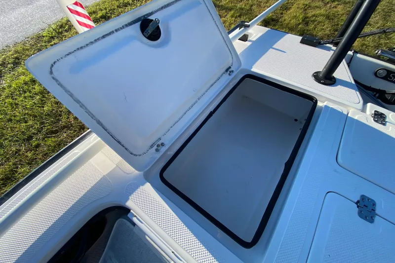 Slide: The Image of 1999 Silver King Signature 16 boat deck with textured surface and metal hinges. - 45