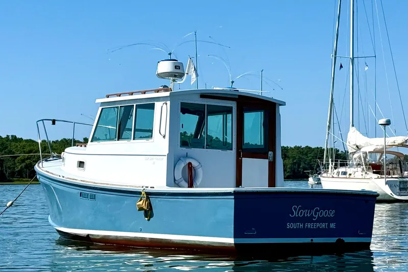 Slide: The Image of 1985 Cape Dory 28 Power Yacht, blue hull, docked in South Freeport, Maine. - 18