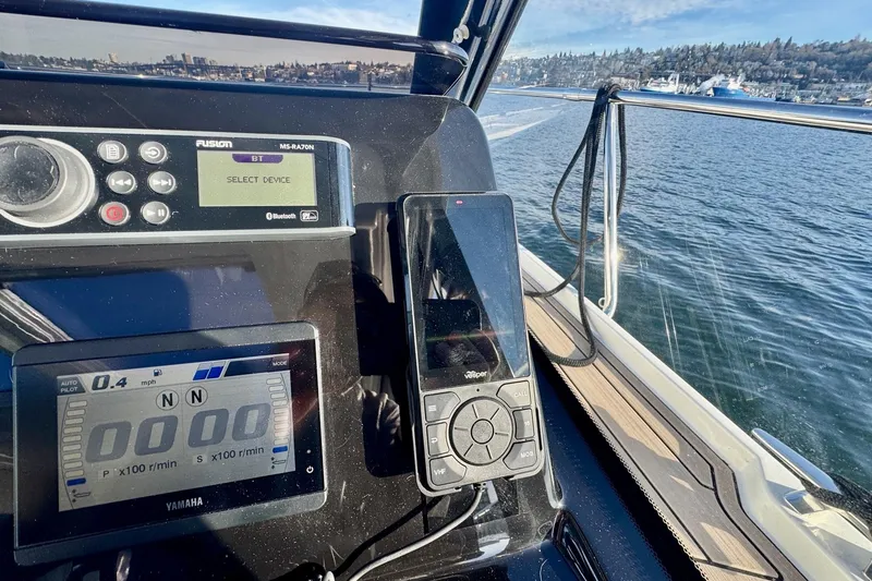 Slide: The Image of 2024 Jeanneau NC 1095 Coupe Series 2 dashboard with navigation and control systems. - 15