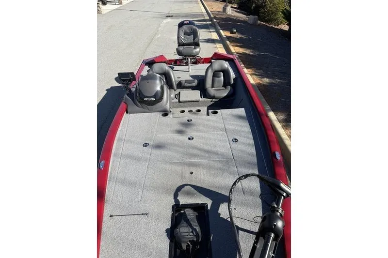 Slide: The Image of 2020 Tracker Pro Team 195 TXW fishing boat with gray deck and seating. - 8