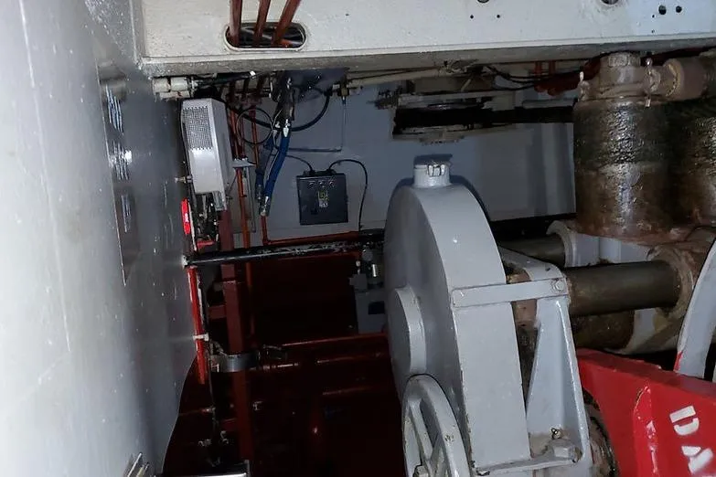 Slide: The Image of Interior machinery of 1970 COMMERICAL BOAT LCU-135, featuring mechanical components and wiring. - 13