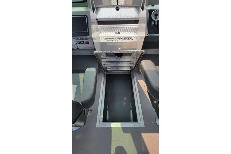 Slide: The Image of Interior of 2026 Smoker Craft Phantom 18 X2 boat, featuring storage compartment and seating. - 10