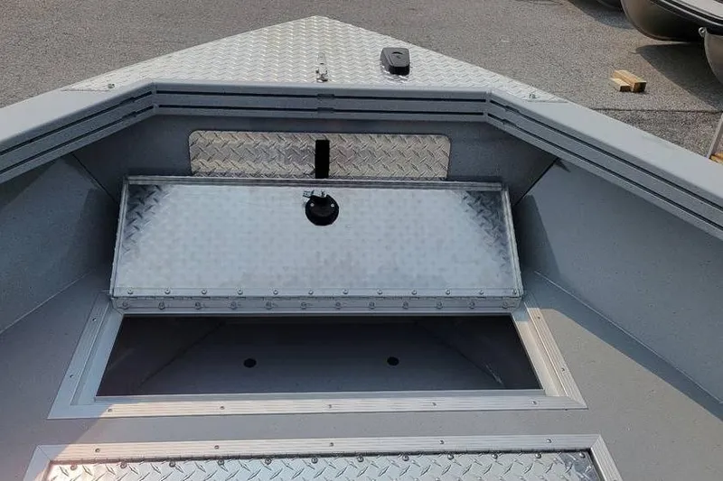 Slide: The Image of 2026 Smoker Craft Phantom 18 X2 boat interior with aluminum storage compartments. - 13