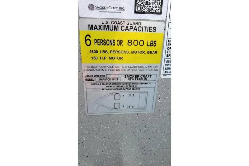 Slide: The Image of Smoker Craft Phantom 18 X2 capacity label, 6 persons or 800 lbs, 150 HP motor. - 23