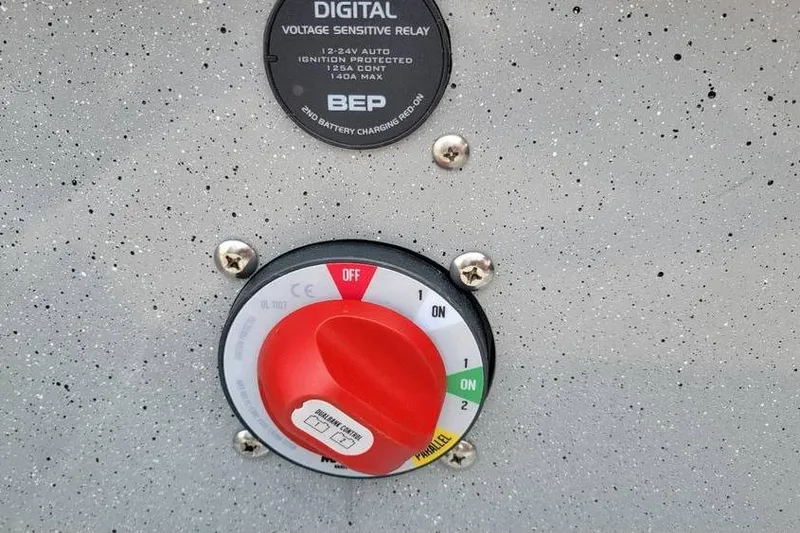 Slide: The Image of Control panel of Smoker Craft Phantom 18 X2 boat, featuring a digital voltage sensitive relay. - 24