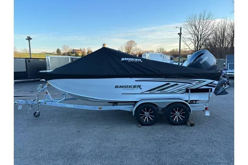 Slide: The Image of 2026 Smoker Craft Phantom 18 X2 boat with Yamaha 150 hp engine, covered and on trailer. - 3