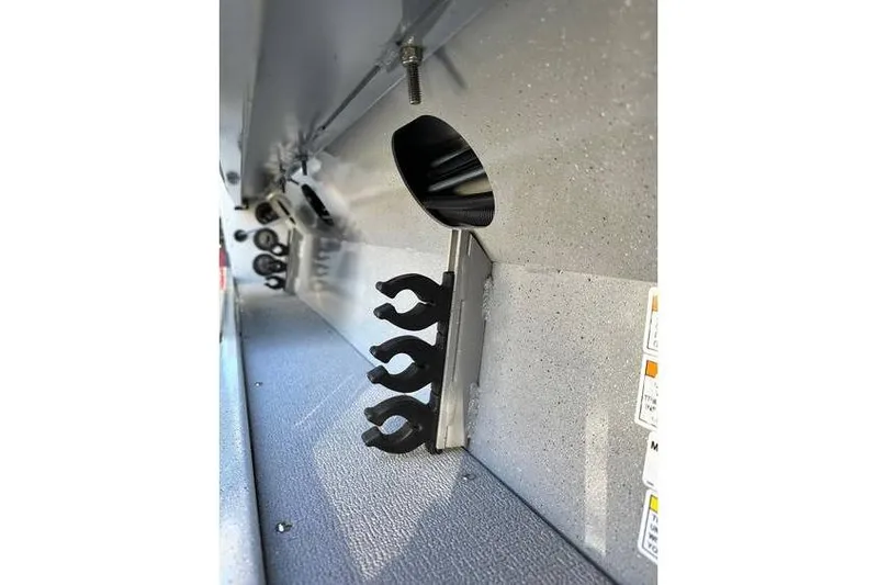 Slide: The Image of Interior view of 2026 Smoker Craft Phantom 18 X2 boat with rod holders. - 4