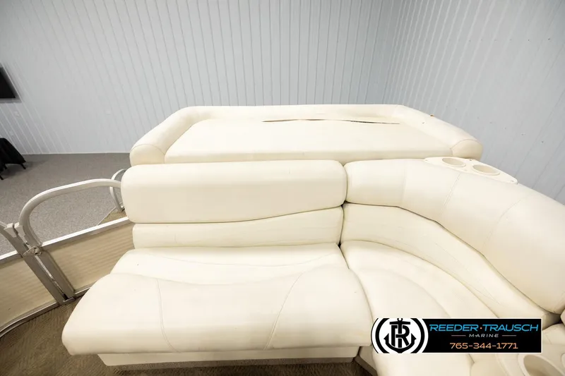 Slide: The Image of 2006 Sun Tracker Party Barge 22 Regency Edition with cream seating and cup holders. - 14