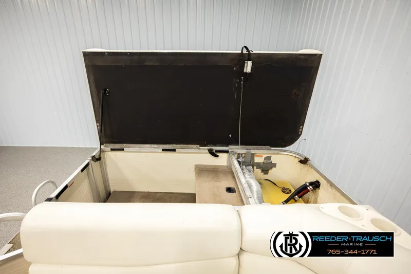 Slide: The Image of 2006 Sun Tracker Party Barge 22 Regency Edition interior storage compartment open. - 23