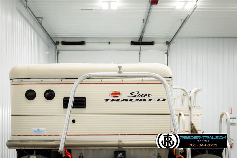 Slide: The Image of 2006 Sun Tracker Party Barge 22 Regency Edition in indoor storage facility. - 6