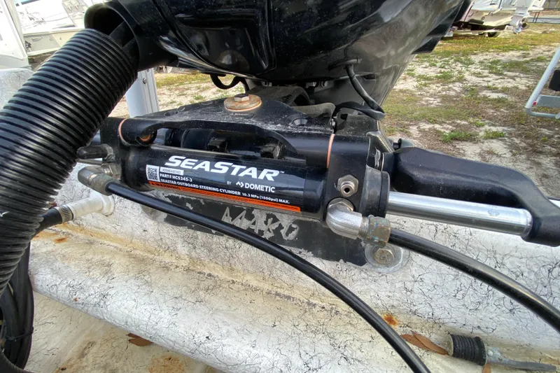 Slide: The Image of Hydraulic steering system on a 2006 Mako 191 Inshore boat, featuring SeaStar by Dometic. - 65